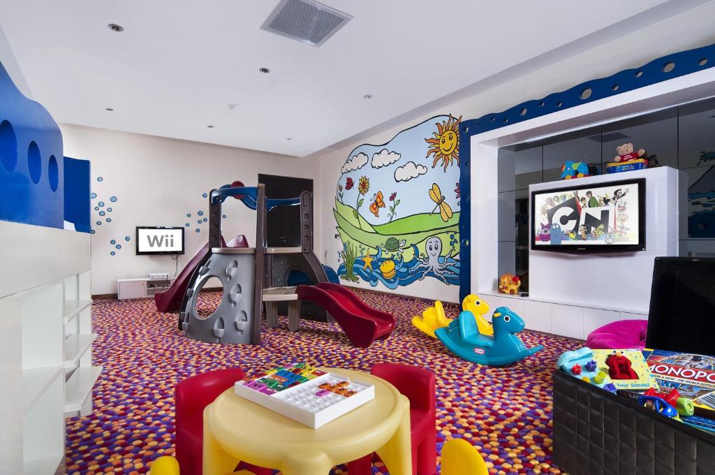 TV a/nebo společenská místnost v ubytování The Edge Bali