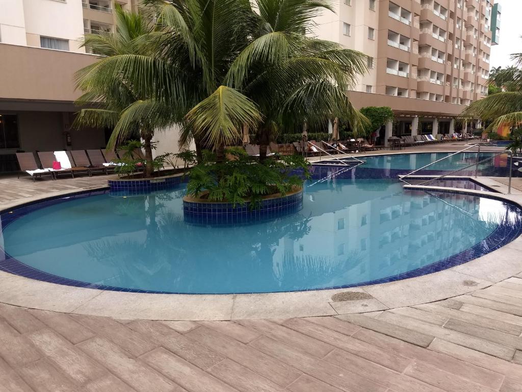 A piscina localizada em Apart Hotel em Olímpia-SP ou nos arredores