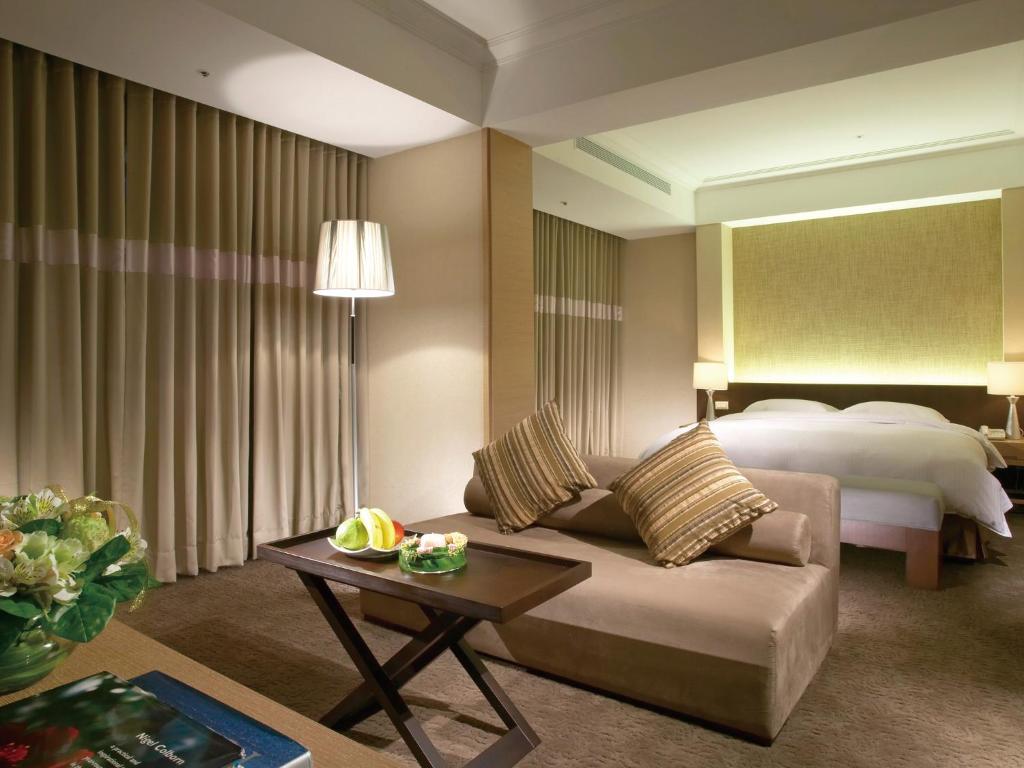 Postel nebo postele na pokoji v ubytování City Suites - Taoyuan Gateway