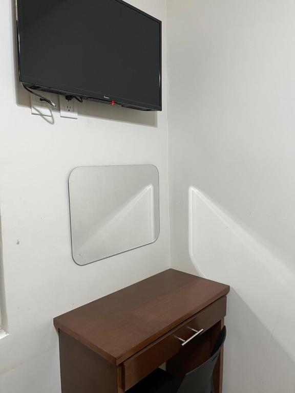 TV a/nebo společenská místnost v ubytování Hotel Posada Ruiseñor