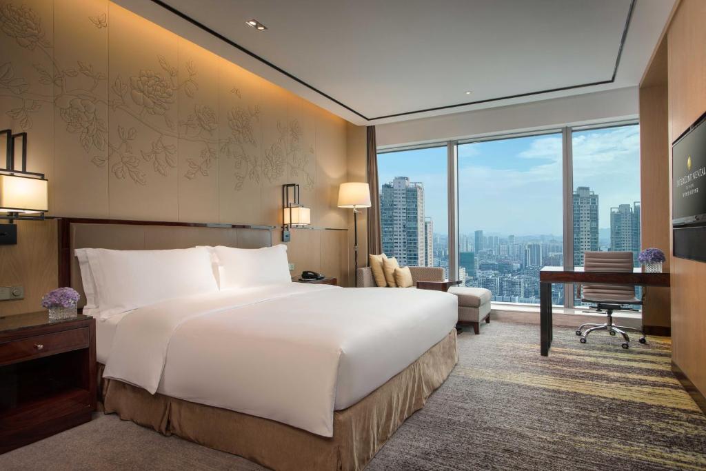 Postel nebo postele na pokoji v ubytování InterContinental Fuzhou