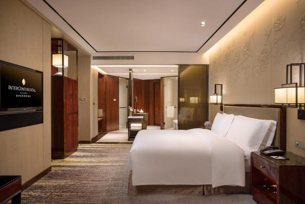 Postel nebo postele na pokoji v ubytování InterContinental Fuzhou