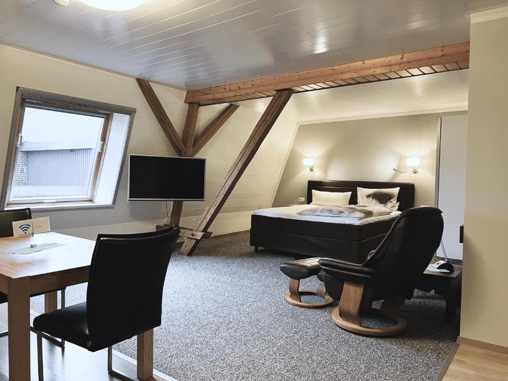 TV a/nebo společenská místnost v ubytování Gästezimmer & Appartement Elskop