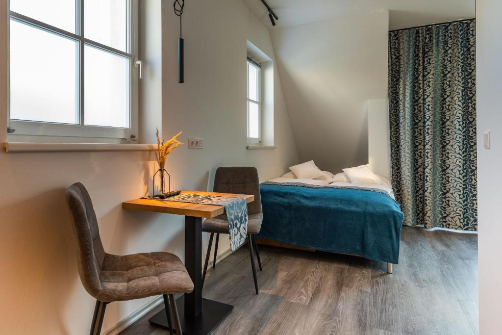 Postel nebo postele na pokoji v ubytování Lichti´s Rooms & Appartements
