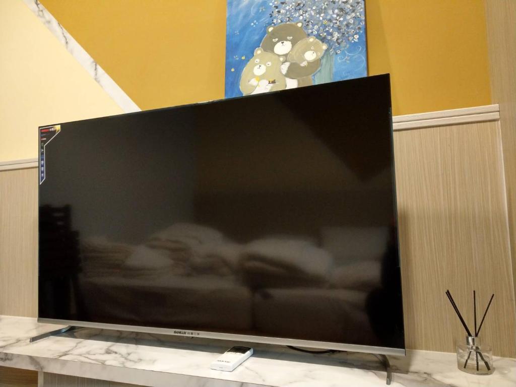 TV a/nebo společenská místnost v ubytování Rainbow