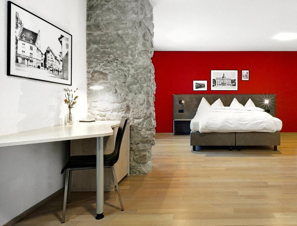 
Ein Bett oder Betten in einem Zimmer der Unterkunft Hotel Zugertor
