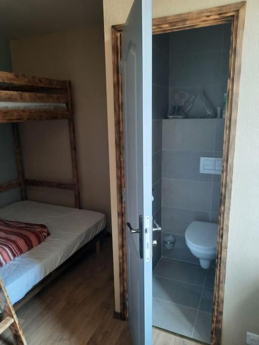 Postel nebo postele na pokoji v ubytování Auberge du Raddon