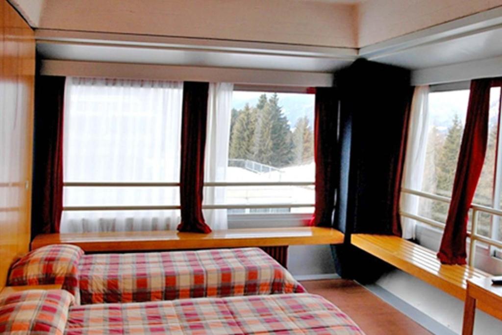 Postel nebo postele na pokoji v ubytování TH 1400 Hotel