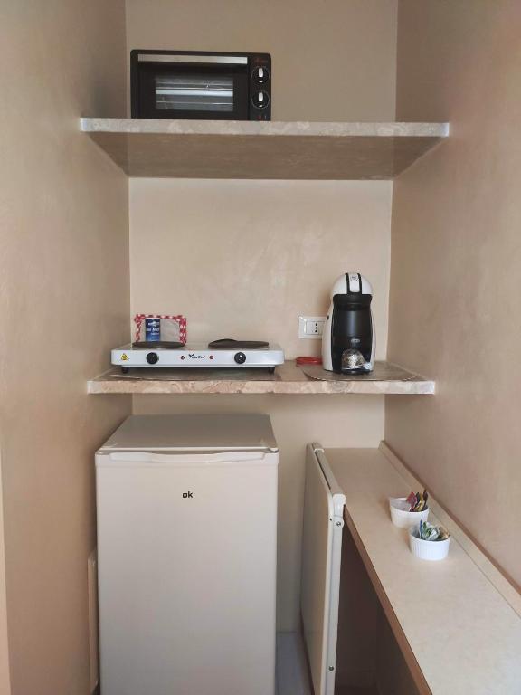 A kitchen or kitchenette at Dimora della Nonna