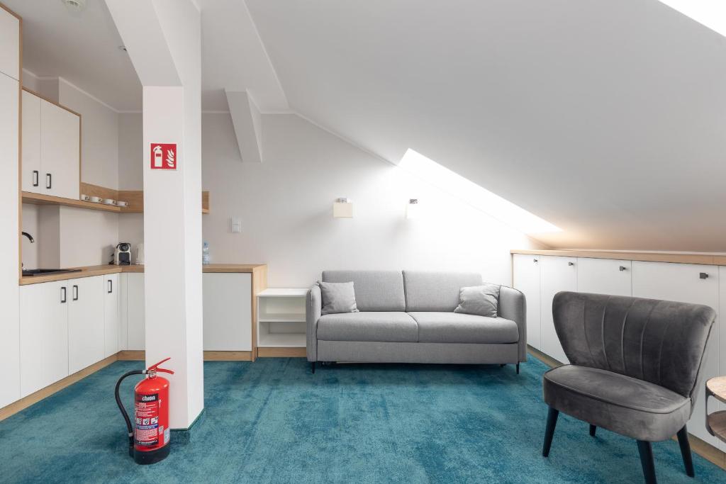 Posedenie v ubytovaní Aparthotel Esencja Warszawy Nowy Świat