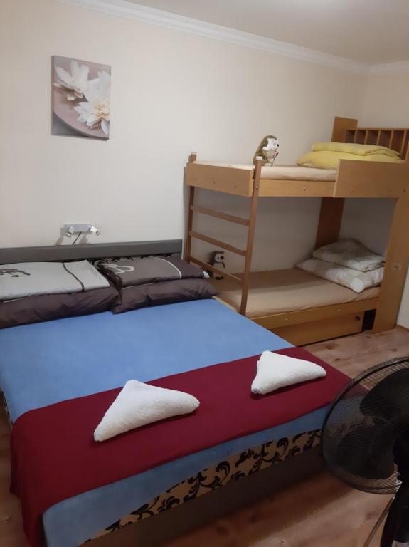 Postel nebo postele na pokoji v ubytování Váradi Apartman