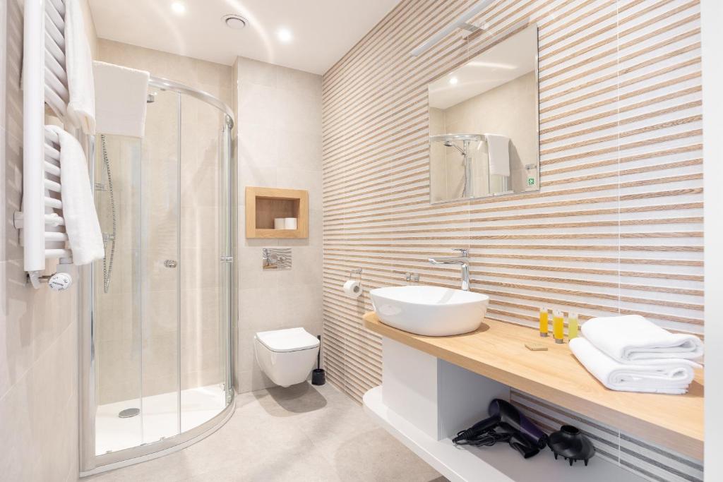 Kúpeľňa v ubytovaní Aparthotel Esencja Warszawy Nowy Świat