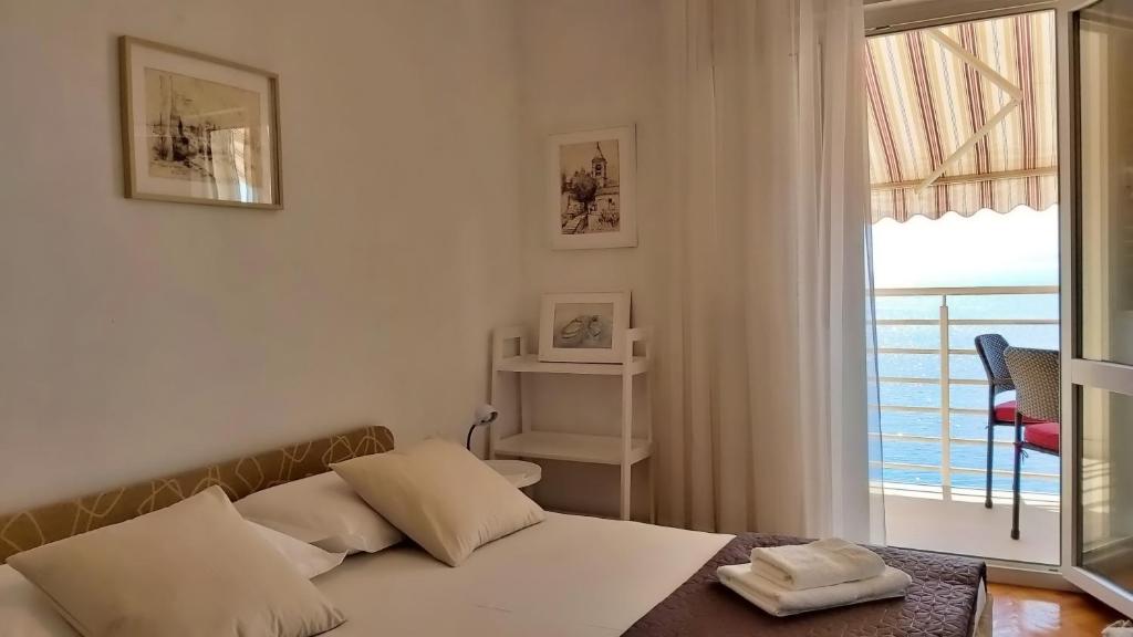 Postel nebo postele na pokoji v ubytování Apartment Juta