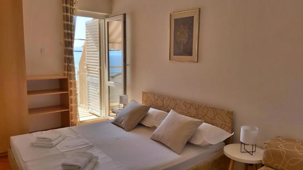 Postel nebo postele na pokoji v ubytování Apartment Juta