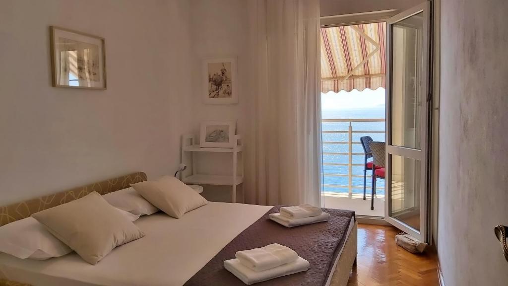 Postel nebo postele na pokoji v ubytování Apartment Juta