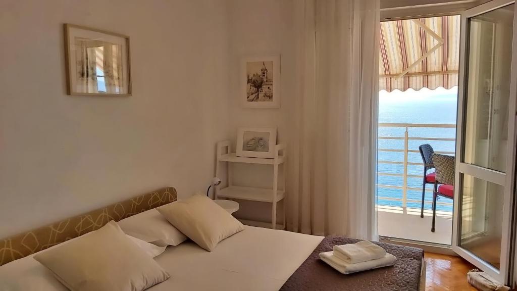 Postel nebo postele na pokoji v ubytování Apartment Juta