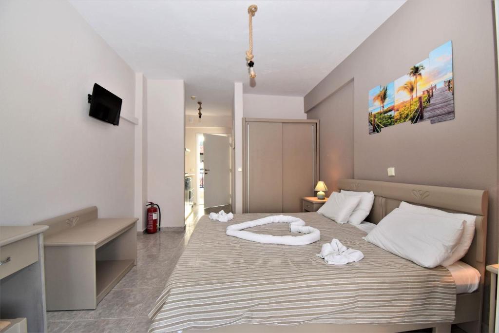 Postel nebo postele na pokoji v ubytování Sueño beach hotel