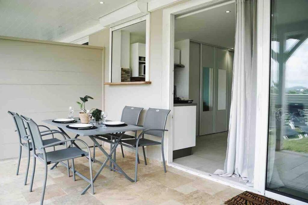 Balkón nebo terasa v ubytování Les Alizés Bleus - Cosy appartement avec piscine