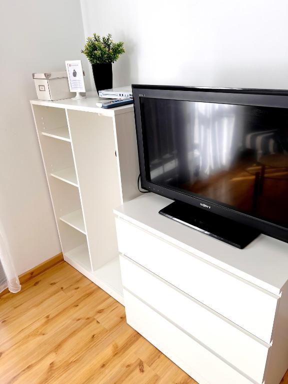 Televisyen dan/atau pusat hiburan di Smile Apartments