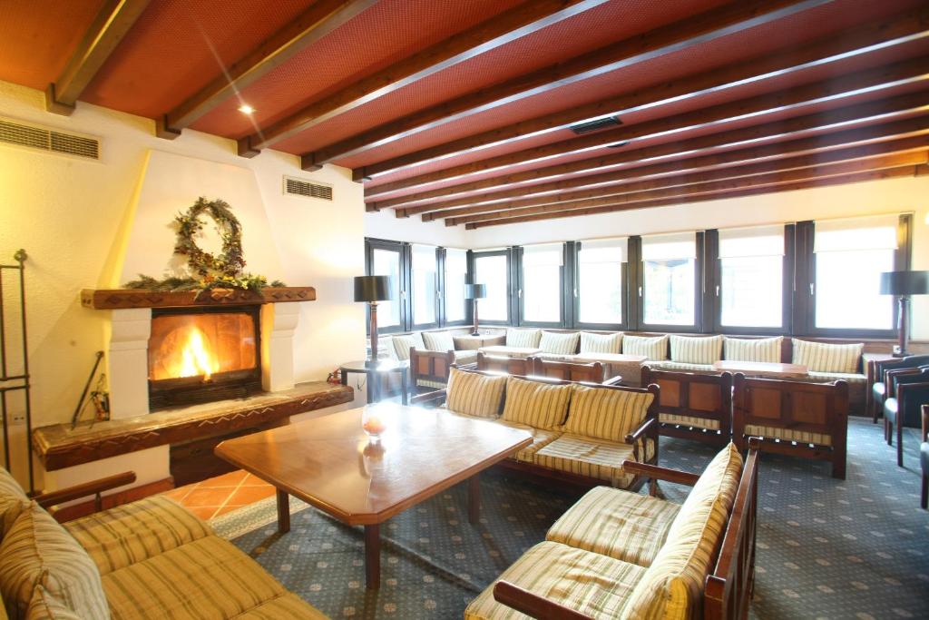 Posezení v ubytování HOTEL SPA MONTANA