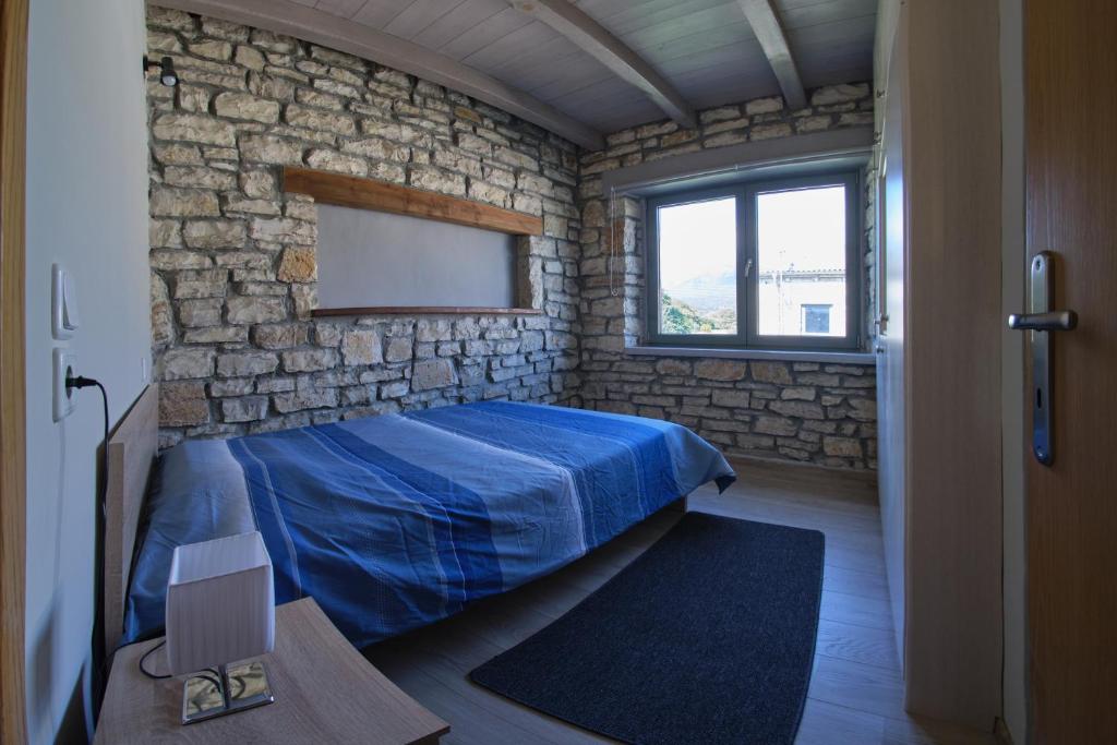 Łóżko lub łóżka w pokoju w obiekcie Kalpaki luxury maisonette 4