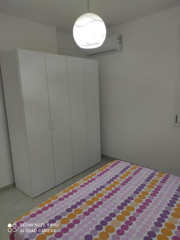 A bed or beds in a room at Casa Sole