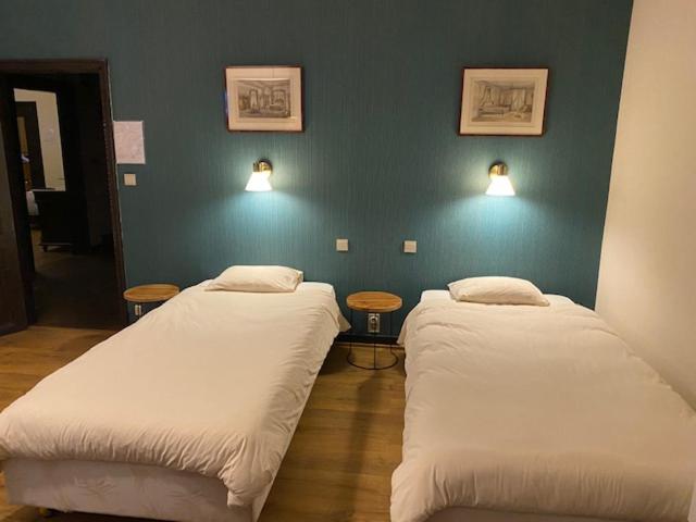 Postel nebo postele na pokoji v ubytování Le Tri Renard Spa