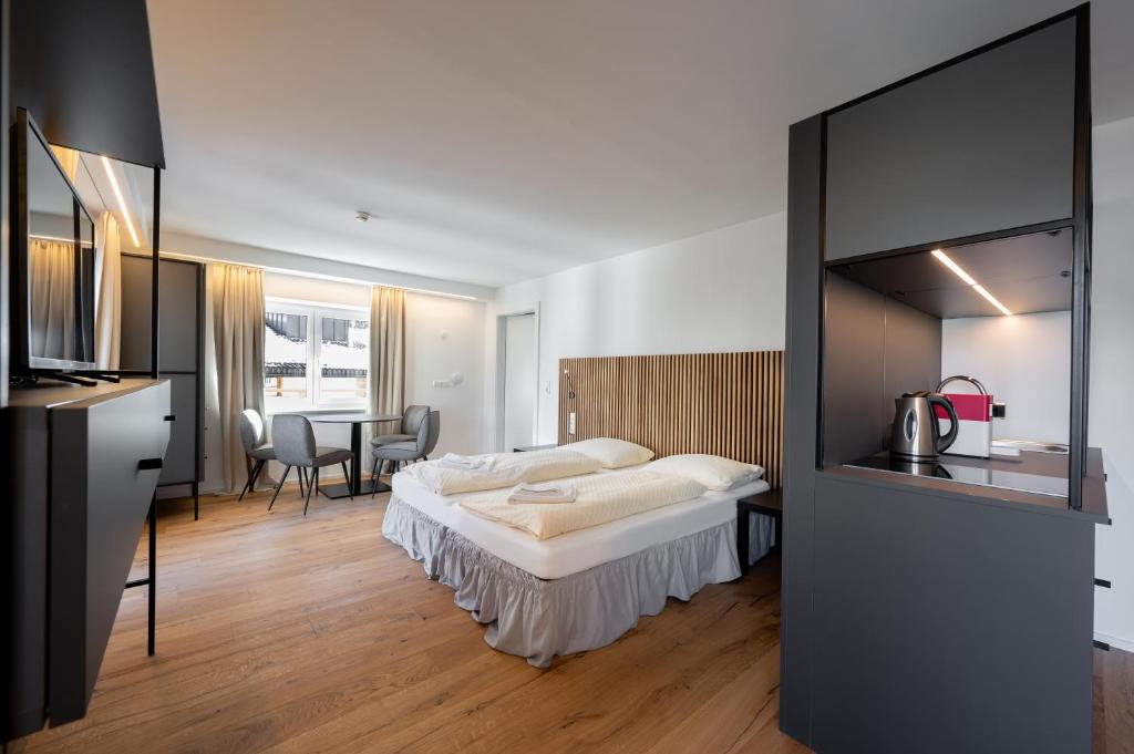 Posteľ alebo postele v izbe v ubytovaní Appartements zur Sonne