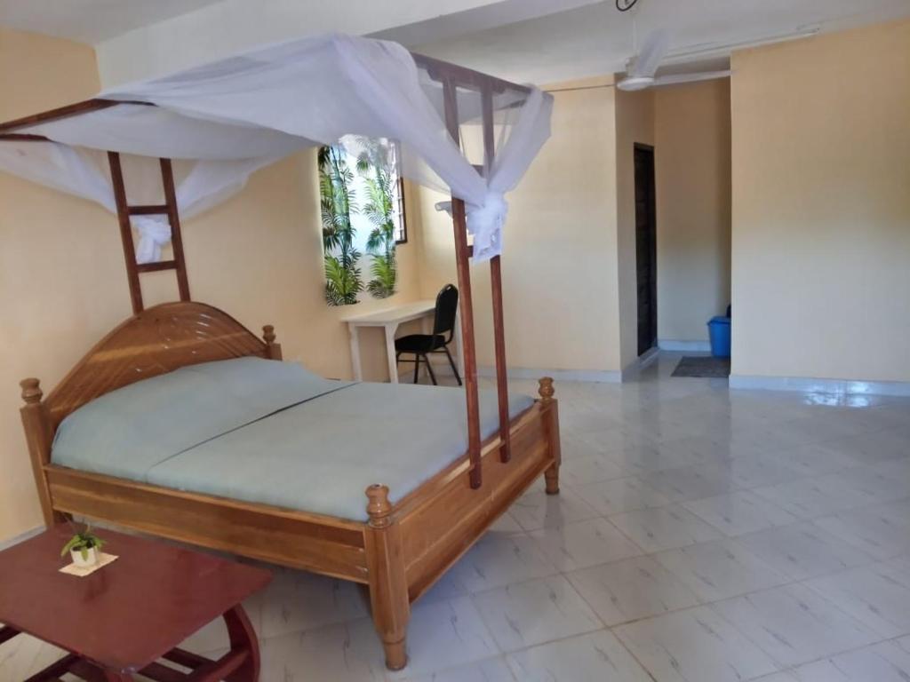 Postel nebo postele na pokoji v ubytování Armaan Guest House
