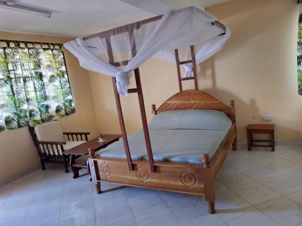 Postel nebo postele na pokoji v ubytování Armaan Guest House