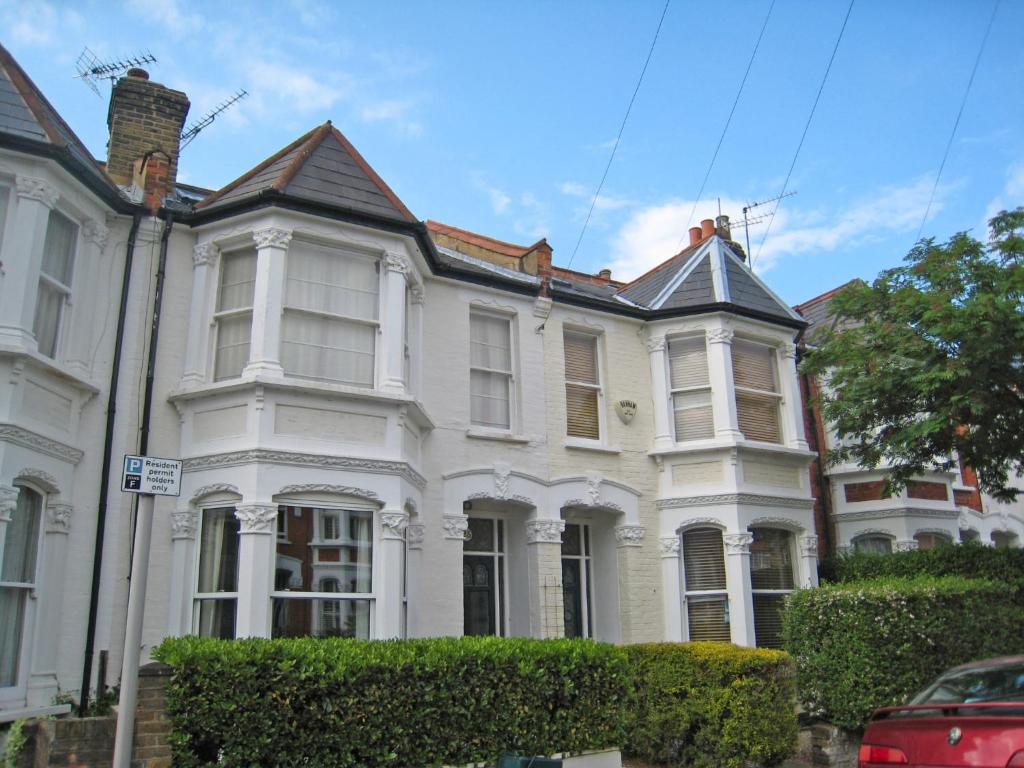 a large white house with a turret at Holiday Home Alexandra Place by Interhome in Richmond upon Thames