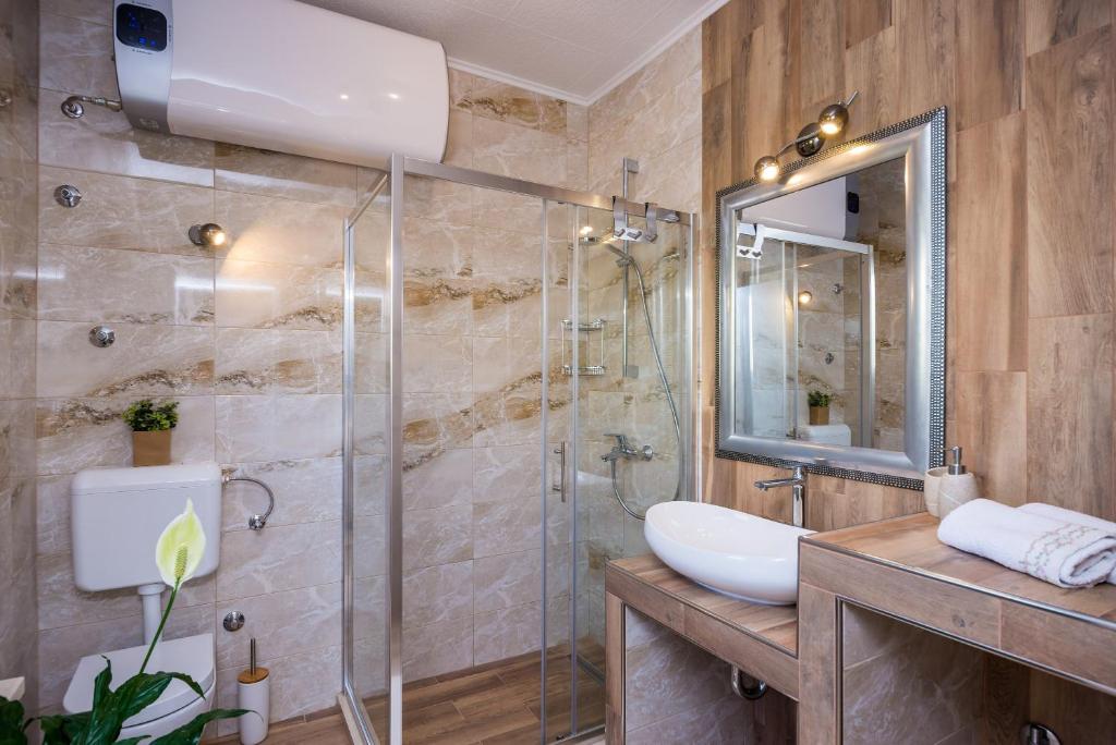 Kúpeľňa v ubytovaní Apartment & Rooms Duja