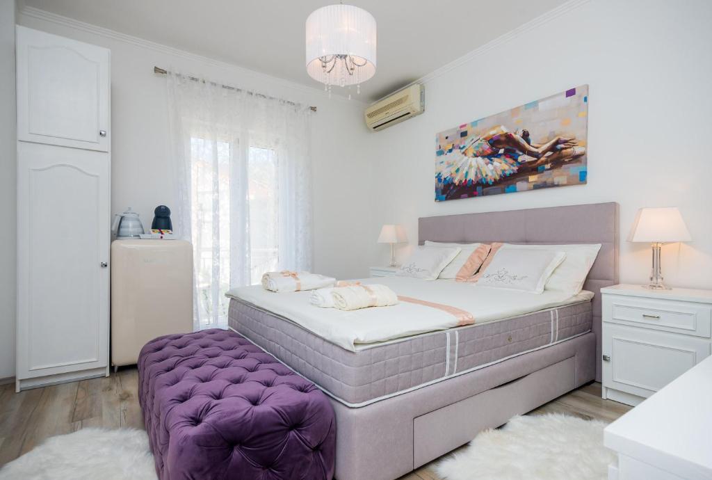 Posteľ alebo postele v izbe v ubytovaní Apartment & Rooms Duja
