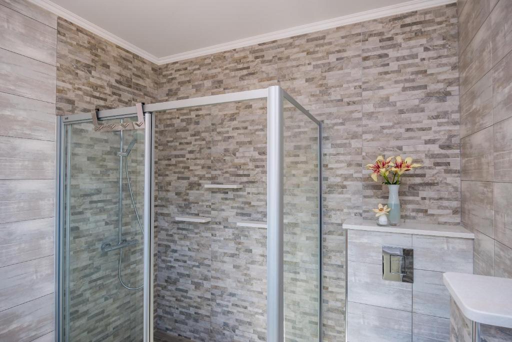 Kúpeľňa v ubytovaní Apartment & Rooms Duja