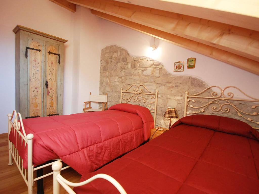 Postel nebo postele na pokoji v ubytování Apartment Albergo Diffuso - Cjasa Ustin-1 by Interhome
