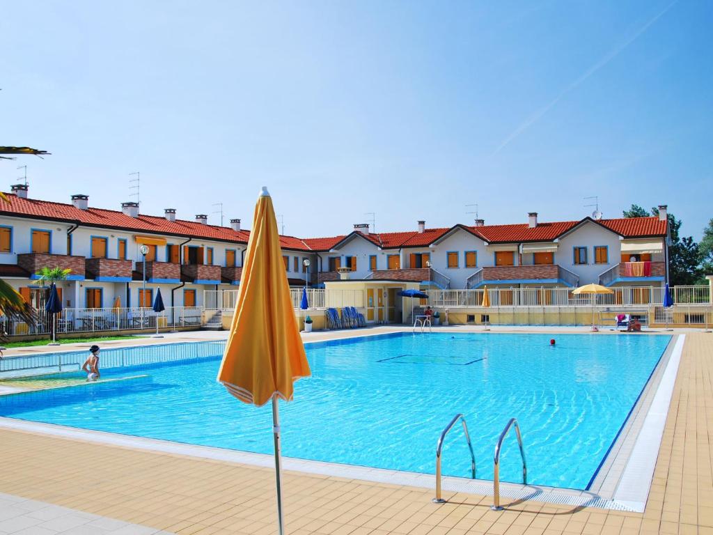 The swimming pool at or close to Apartment Solmare-7 by Interhome