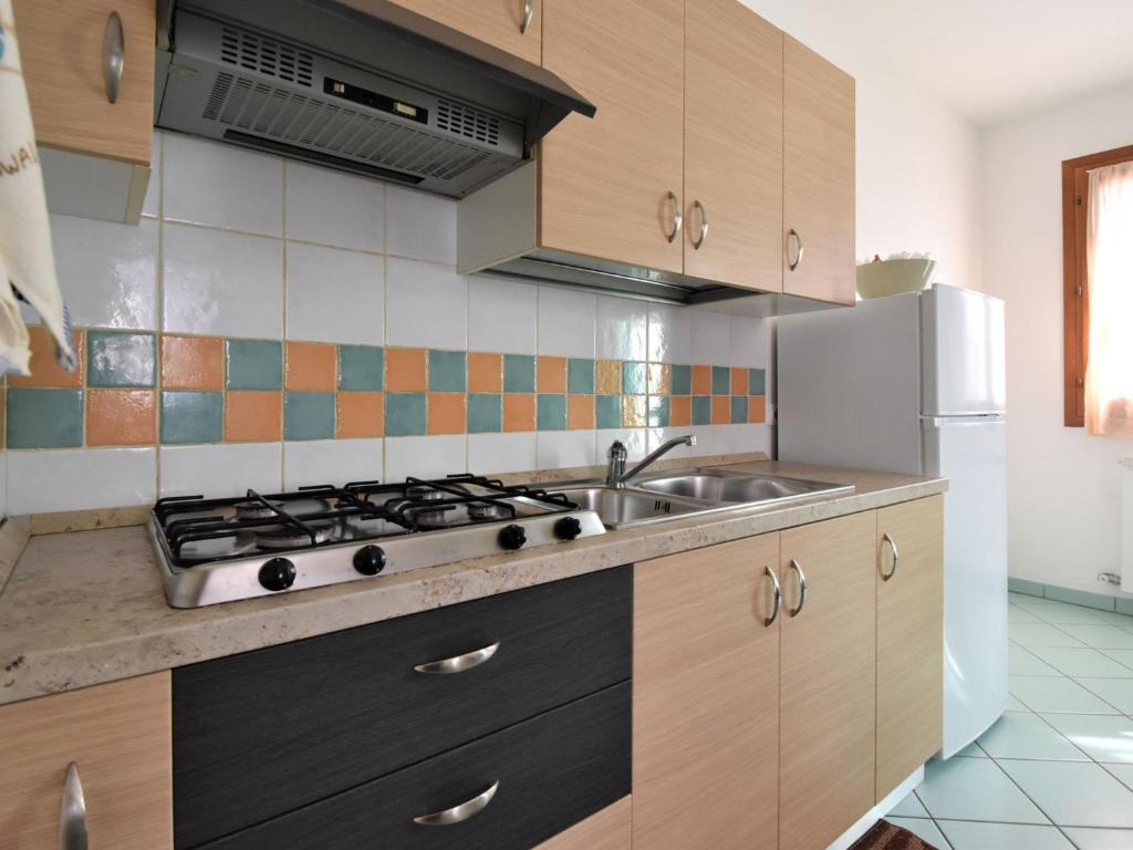 A kitchen or kitchenette at Apartment Solmare-7 by Interhome