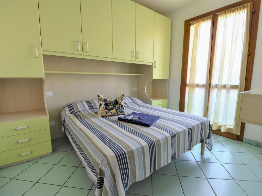 Postel nebo postele na pokoji v ubytování Apartment Solmare-14 by Interhome