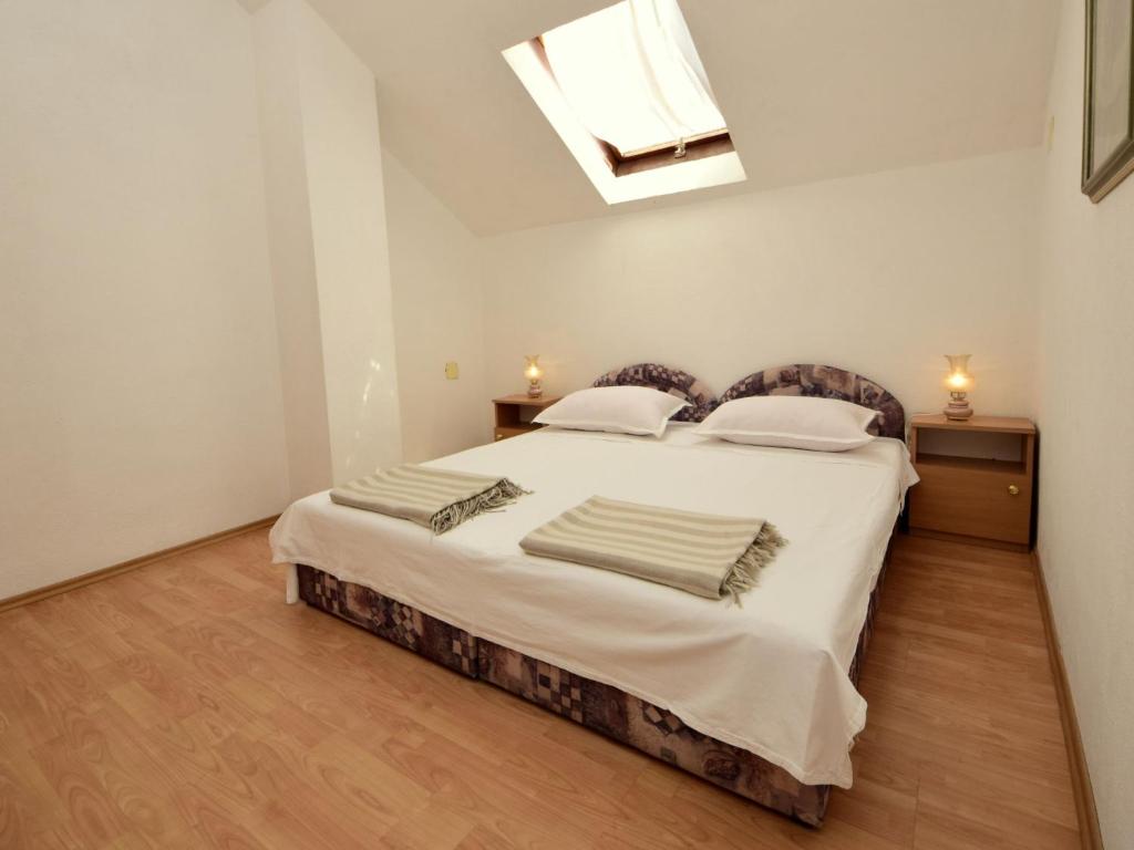 Postel nebo postele na pokoji v ubytování Apartment Margita by Interhome