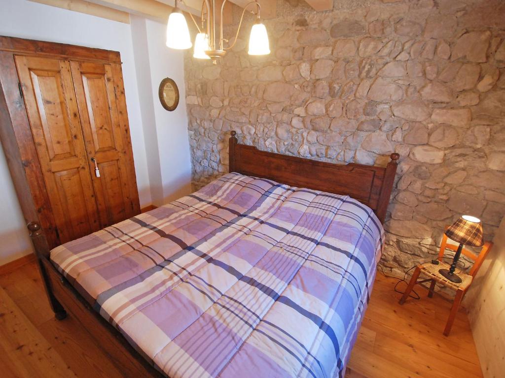 Postel nebo postele na pokoji v ubytování Apartment Albergo Diffuso - Cjasa Ustin-2 by Interhome