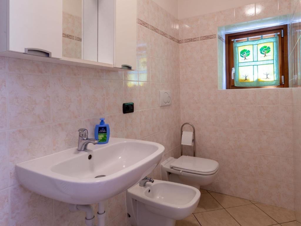 Koupelna v ubytování Holiday Home Elisa by Interhome
