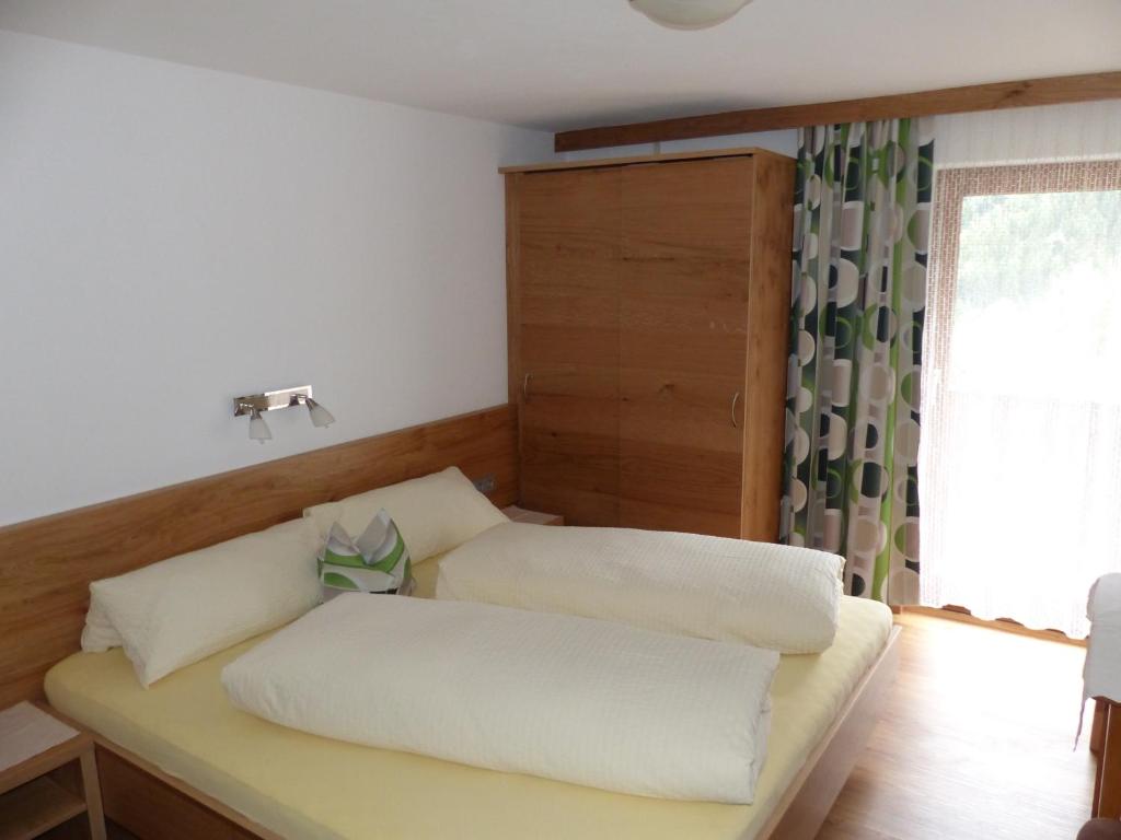 Rúm í herbergi á Haus Wechner