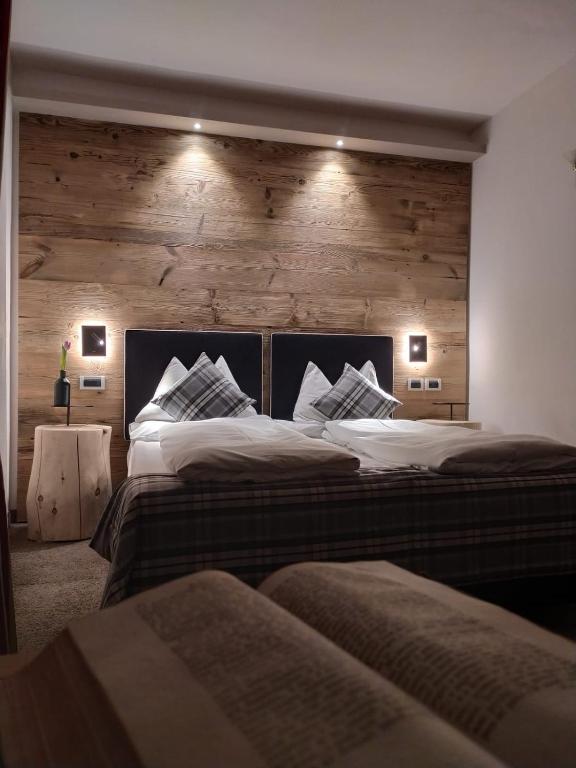 Postel nebo postele na pokoji v ubytování Romantic Hotel Excelsior