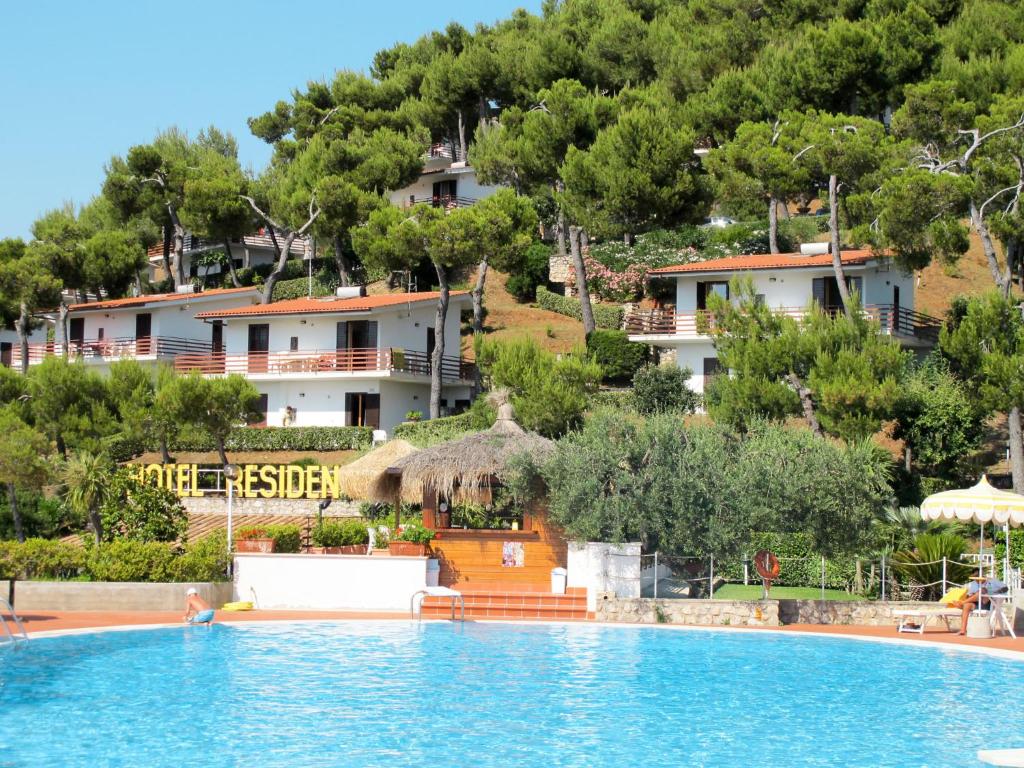 a view of the swimming pool at a resort at Apartment Costa di Kair ed Din-1 by Interhome in Sperlonga