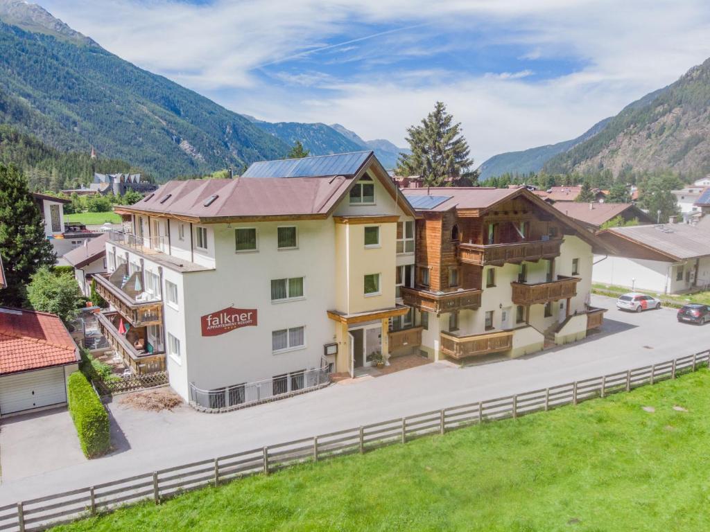 an aerial view of a hotel with mountains in the background at Apartment Falkner-13 by Interhome in Oberlängenfeld