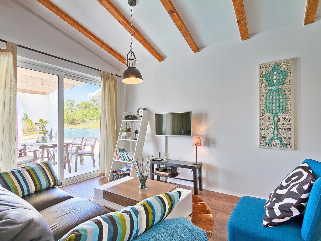 Posedenie v ubytovaní Holiday Home Ravan by Interhome