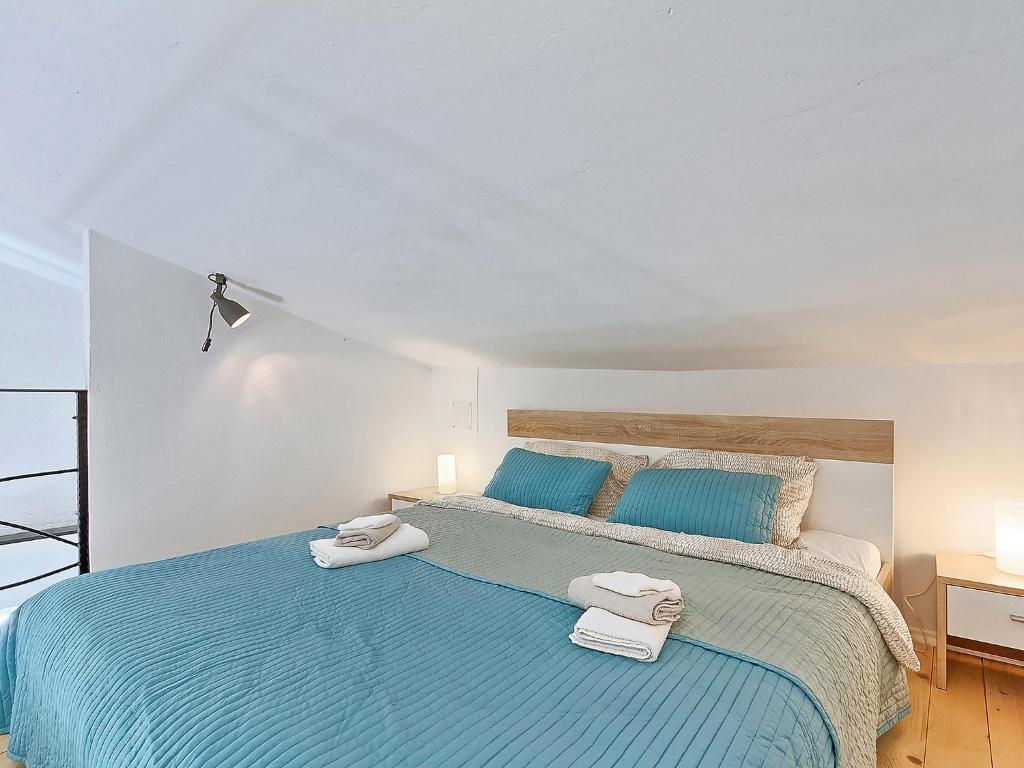Posteľ alebo postele v izbe v ubytovaní Holiday Home Ravan by Interhome