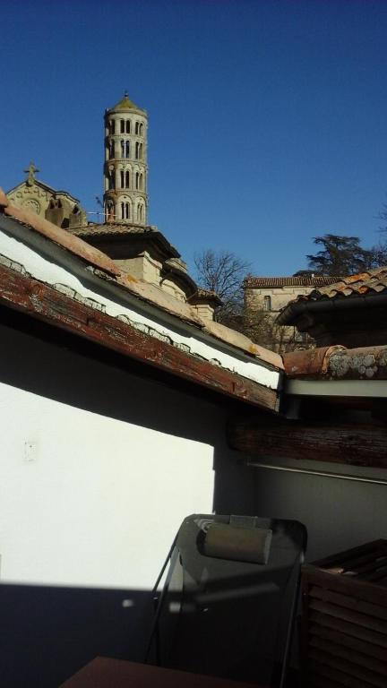 a view of a building with a clock tower at Kira in Uzès