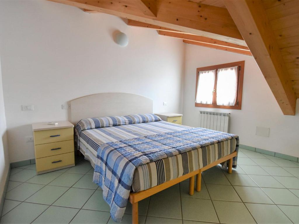 Posteľ alebo postele v izbe v ubytovaní Apartment Solmare-38 by Interhome