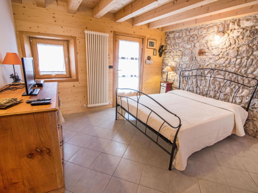 Postel nebo postele na pokoji v ubytování Apartment Albergo Diffuso - Cjasa Ustin-4 by Interhome